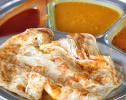 Roti canai dish in Kuala Lumpur. One of The Best of Malaysian Food in Kuala Lumpur