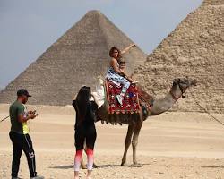 Riding camel in Pyramids-of-Giza Egypt Outdoor activities-Africa