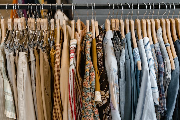 Slim Hangers, with double-hang rods for good organization of a small Space-Efficient Wardrobe. 