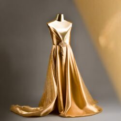 Liquid Gold color Evening simple dress metallic fabrics and bold accessories--2024 Fashion